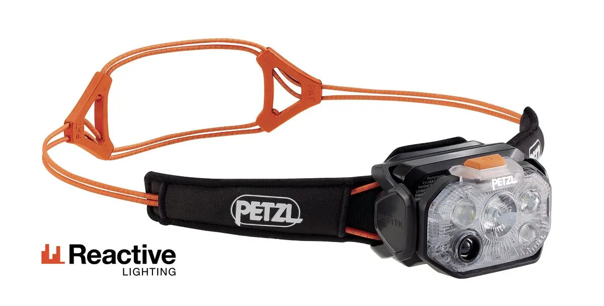 Челник PETZL SWIFT RL 2026, 1200 Лумена, Черен/оранжев