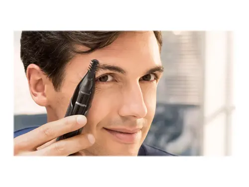 Philips Τρίμερ μύτης και αυτιών: 100 αδιάβροχο, Σύστημα προστατευτικού καλύμματος διπλής όψης, περιλαμβάνεται μπαταρία AA, 2 χτενάκια φρυδιών 3mm/5mm - 7