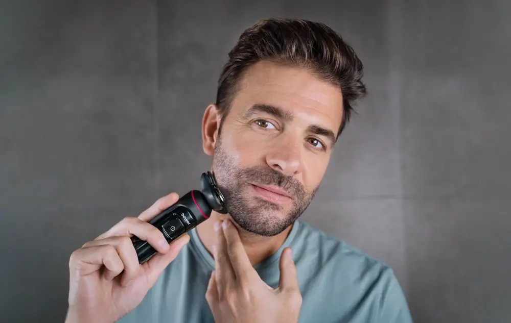 Машинка за бръснене, Beurer MN8X rotary shaver, 360° flexible shaver head, Magnetic fixation, LED display, Waterproof (IPX7), Quick-charge function (10 min OT; 5 min CT), Incl. charger and storage station, protective cap and cleaning brush - image 9