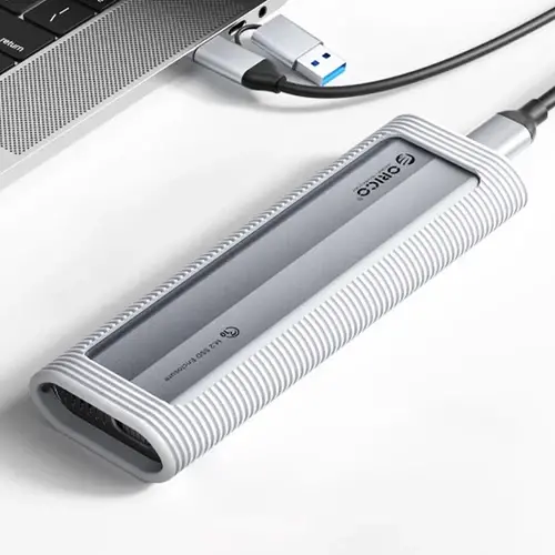 Orico carcasă externă pentru disc Storage - Case - M.2 NVMe/SATA M/B key - USB3.1 Type-C, husă de protecție din silicon, 10Gbps - AXM2S-G2-GY-BP - image 1